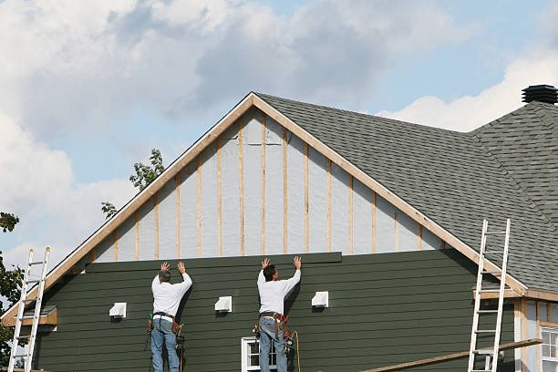Professional Siding technician working in Maysville, GA